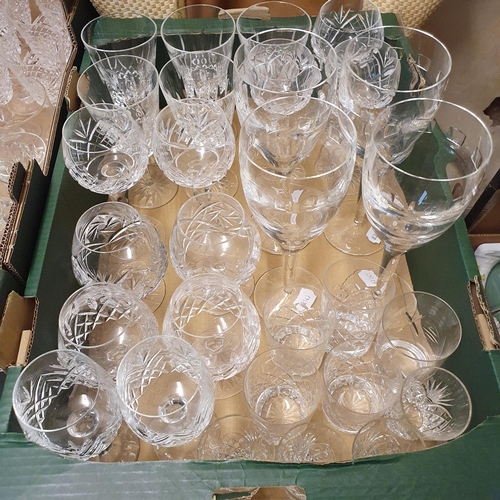 1005 - A set of four Waterford wine glasses, other glassware, a picnic set, and a box of assorted linen (5 ... 