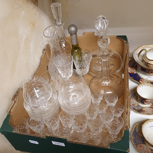 1005 - A set of four Waterford wine glasses, other glassware, a picnic set, and a box of assorted linen (5 ... 