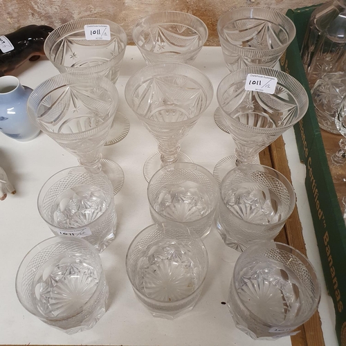 1011 - A set of six cut glass tumblers, and a set of six similar wine glasses (12)