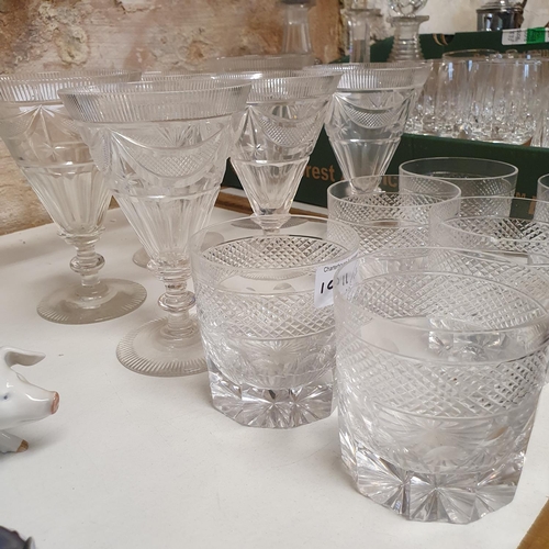 1011 - A set of six cut glass tumblers, and a set of six similar wine glasses (12)