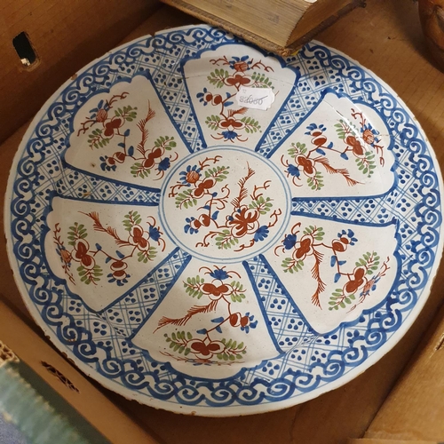 1015 - A Delft polychrome plate, 32 cm diameter, a wooden pestle and mortar, and a Victorian photograph alb... 