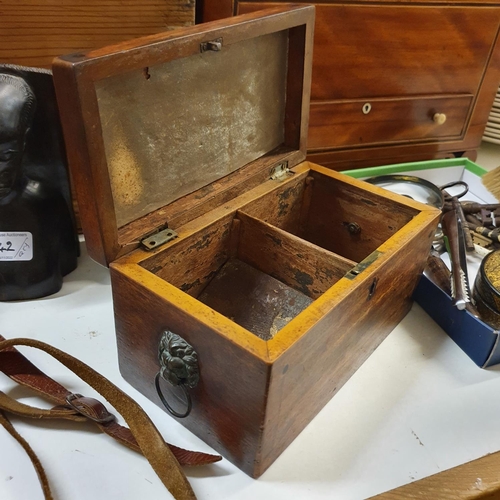 1042 - A mahogany jewellery box, 35 cm wide, a pine box, a tea caddy, a pair of carved bookends, and assort... 