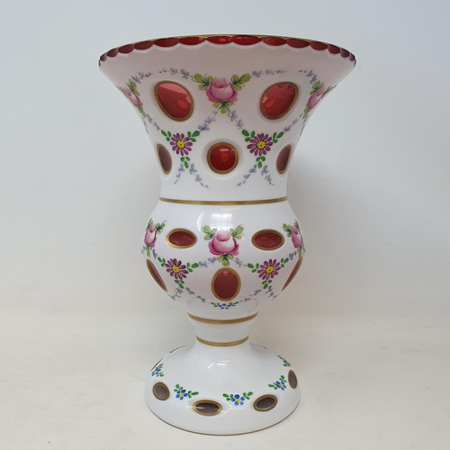 1179 - A cased glass vase, decorated flowers, 22 cm high