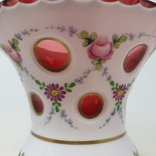 1179 - A cased glass vase, decorated flowers, 22 cm high