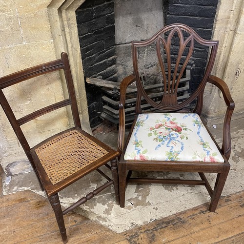 1303 - A walnut chest, having two short and two long drawers, two chairs,