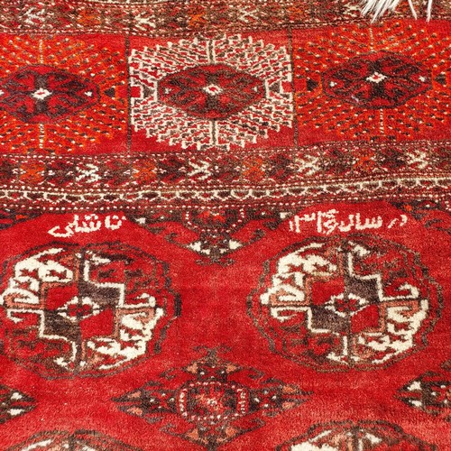 1218 - ***WITHDRAWN***A Turkish red ground carpet, 235 x 186 cm