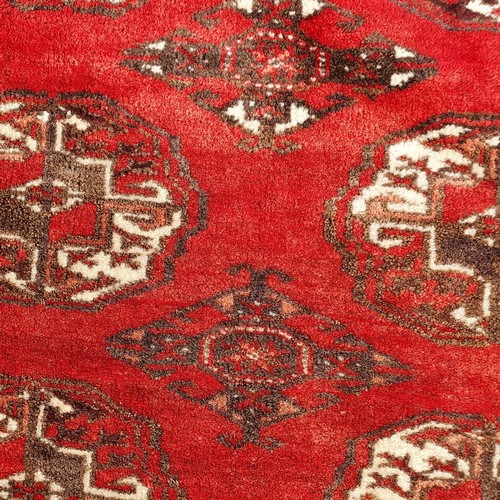 1218 - ***WITHDRAWN***A Turkish red ground carpet, 235 x 186 cm