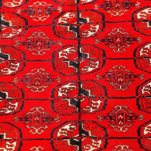 1217 - ***WITHDRAWN***A Turkish red ground rug, 180 x 123 cm