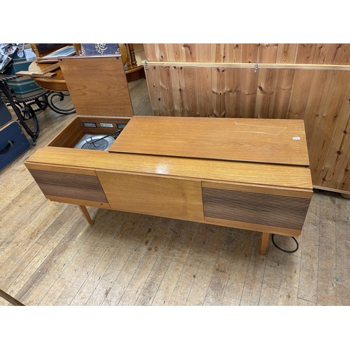 1268 - A 1970s dressing table, a matching chest, a tile top table, a marble topped table and a radiogram (5... 