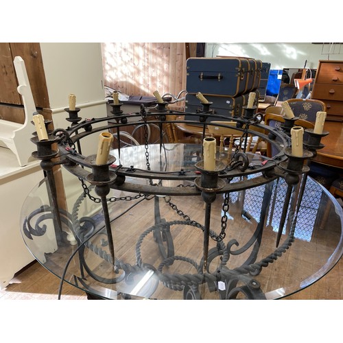 1274 - A large wrought iron chandelier, 122 cm diameter