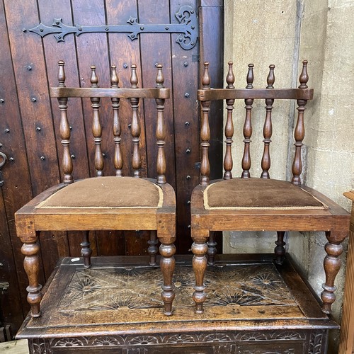 1302 - An oak coffer, 103 cm wide, four chairs, a child's chair, a wicker wine rack, and a chest of drawers... 