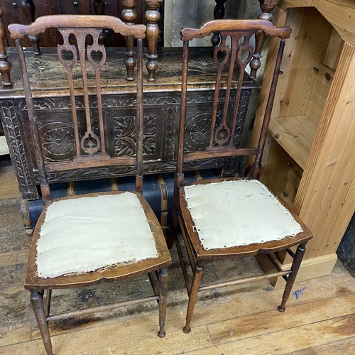 1302 - An oak coffer, 103 cm wide, four chairs, a child's chair, a wicker wine rack, and a chest of drawers... 