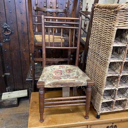 1302 - An oak coffer, 103 cm wide, four chairs, a child's chair, a wicker wine rack, and a chest of drawers... 