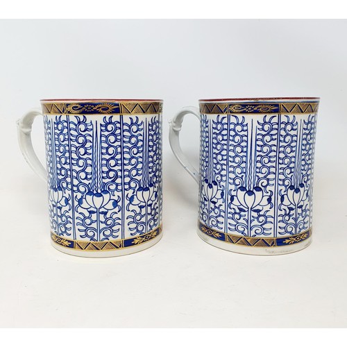 1135 - A pair of Worcester porcelain mugs, 13 cm high, crescent moon mark to base