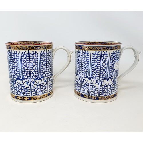 1135 - A pair of Worcester porcelain mugs, 13 cm high, crescent moon mark to base