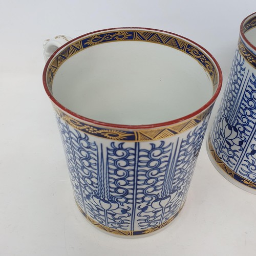 1135 - A pair of Worcester porcelain mugs, 13 cm high, crescent moon mark to base