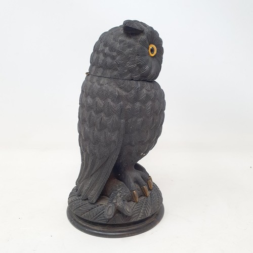 1141 - A 19th century carved inkwell, in the form of an owl, 17 cm high