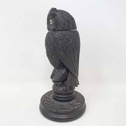 1142 - A 19th century carved inkwell, in the form of an owl, 15 cm high