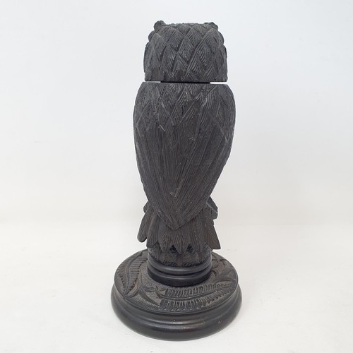 1142 - A 19th century carved inkwell, in the form of an owl, 15 cm high