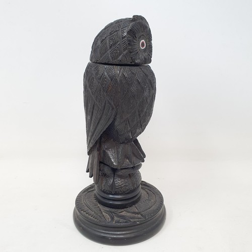 1142 - A 19th century carved inkwell, in the form of an owl, 15 cm high