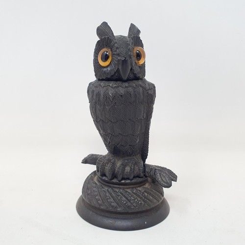 1143 - A 19th century carved inkwell, in the form of an owl, 10.5 cm high