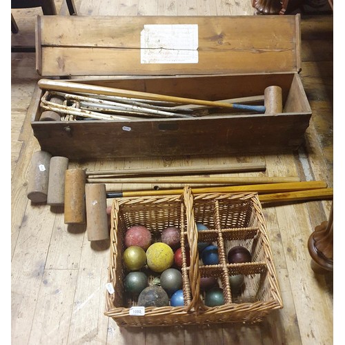 1080 - A Slazenger & Son croquet set, extra mallets and a wicker basket (qty)