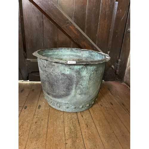 1325 - A copper log basket, 50 cm diameter