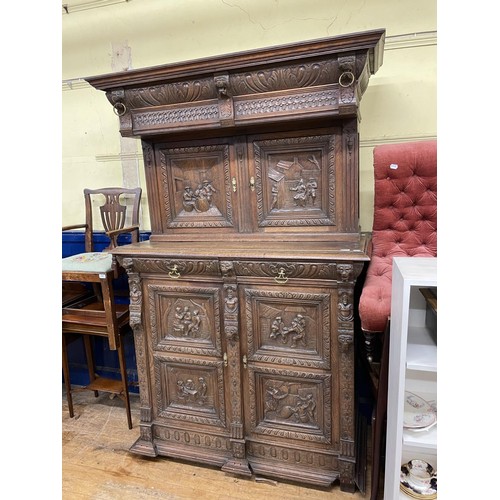 1281 - An early 20th century French carved oak buffet, 131 cm wide