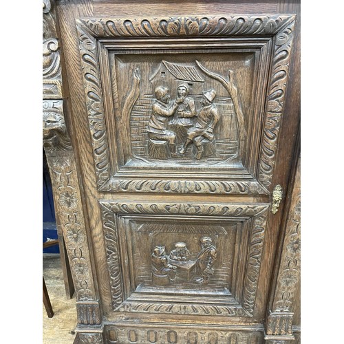 1281 - An early 20th century French carved oak buffet, 131 cm wide