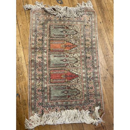 1335 - A Persian prayer rug, 104 x 60 cm  and for others, (5)