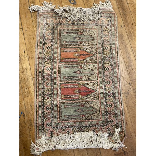 1335 - A Persian prayer rug, 104 x 60 cm  and for others, (5)