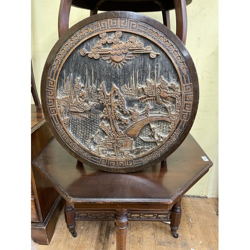 1304 - A walnut lamp table, another, and a carved Asian plaque (3)