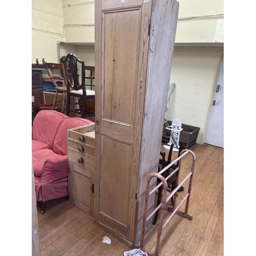 1299 - A pine cupboard 203 cm high x 51 cm wide, a pine unit, a towel rail, a two tier table, and two chair... 