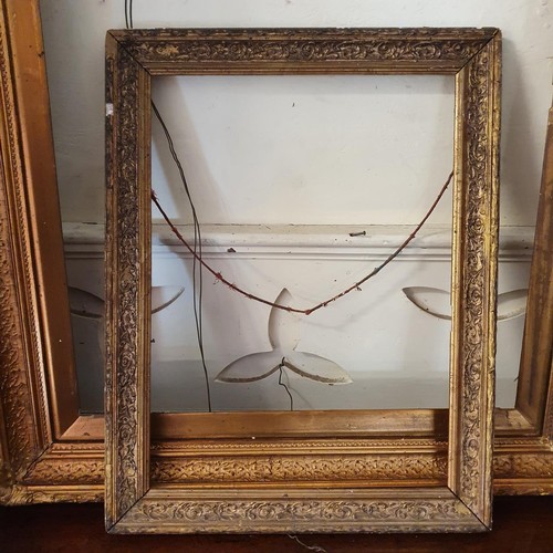 1164 - A gilt gesso picture frame, 107 x 76 cm, and two others (3)