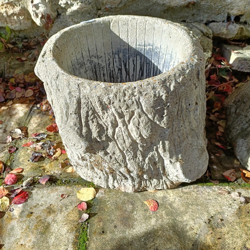 1308 - A pair of composite stone garden planters, in the form of logs, 26 cm high