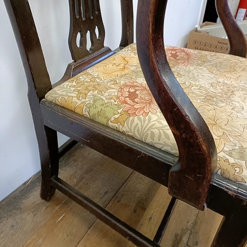 1206 - A 19th century mahogany armchair, with a pierced splat back and drop in seat