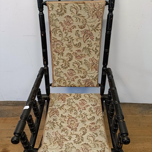 1210 - An early 20th century painted American style rocking chair