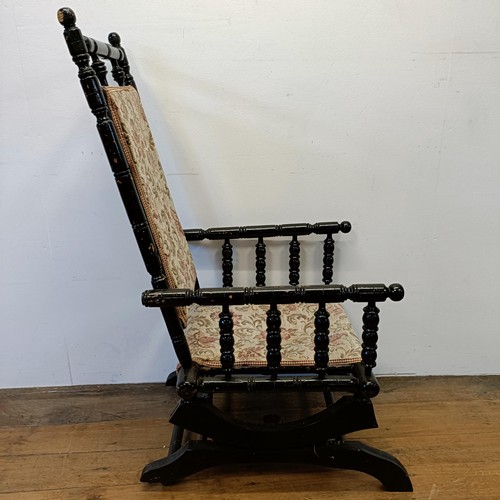 1210 - An early 20th century painted American style rocking chair