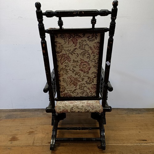 1210 - An early 20th century painted American style rocking chair