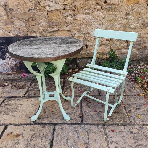 1340 - A garden table, 80 cm diameter and chair