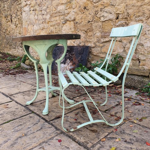 1340 - A garden table, 80 cm diameter and chair