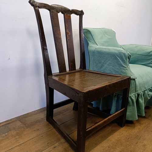 1244 - An early 20th century armchair, and an oak single chair (2)