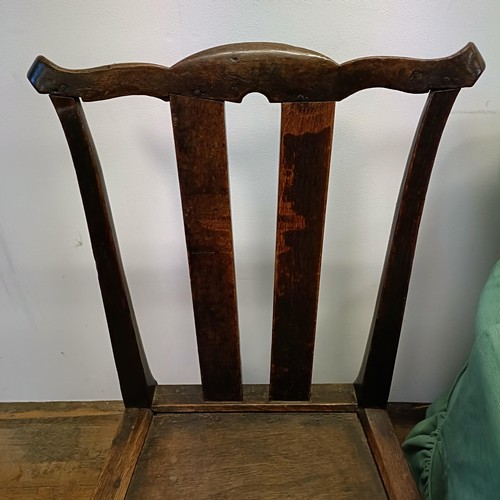 1244 - An early 20th century armchair, and an oak single chair (2)