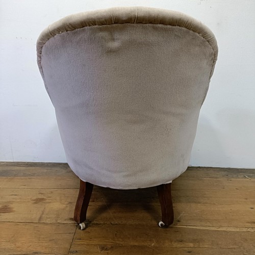 1208 - A 19th century button back armchair, on cabriole legs