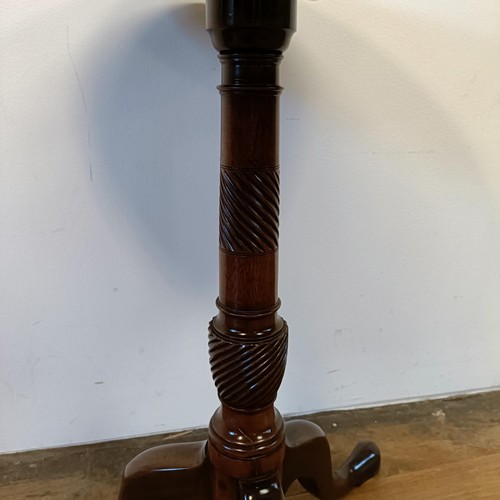 1317 - A 19th century mahogany table, on a tripod base, diameter 56 cm diameter