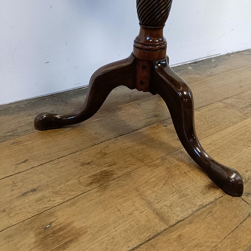 1317 - A 19th century mahogany table, on a tripod base, diameter 56 cm diameter