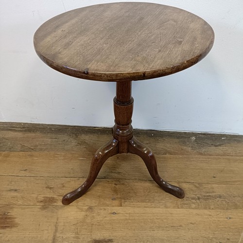 1316 - A mahogany table, on a tripod base, 45 cm wide