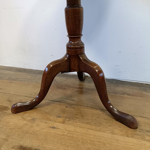 1316 - A mahogany table, on a tripod base, 45 cm wide