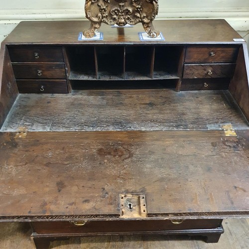 1189 - A George III oak fall front bureau, 91 cm wide