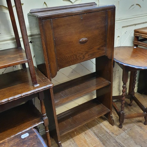 1190 - A oak student's bookcase, 61 cm wide, three tables, a wicker basket, and a walnut three tier table (... 